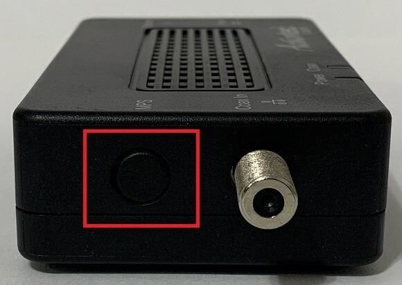 A black box with a round button

Description automatically generated, Picture